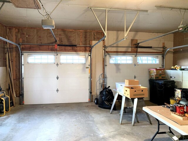 garage featuring a garage door opener