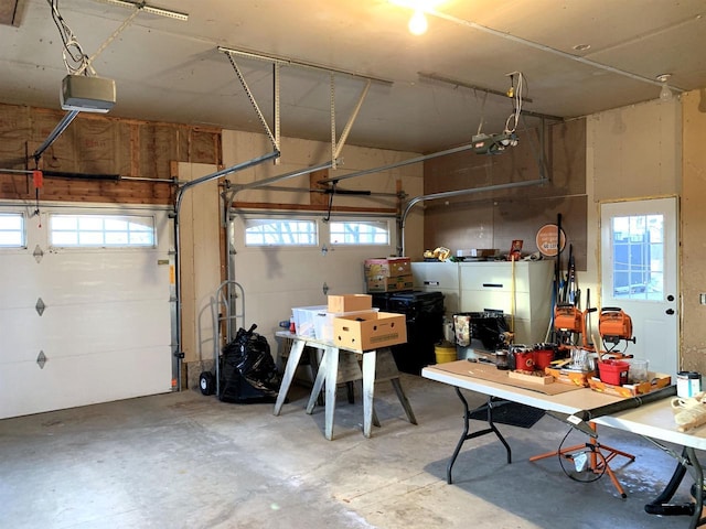 garage featuring a garage door opener
