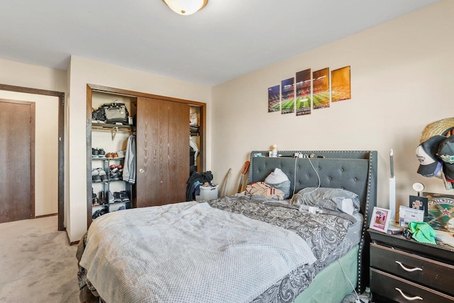 bedroom with carpet floors and a closet