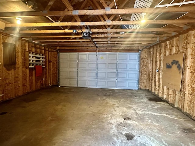 garage featuring a garage door opener