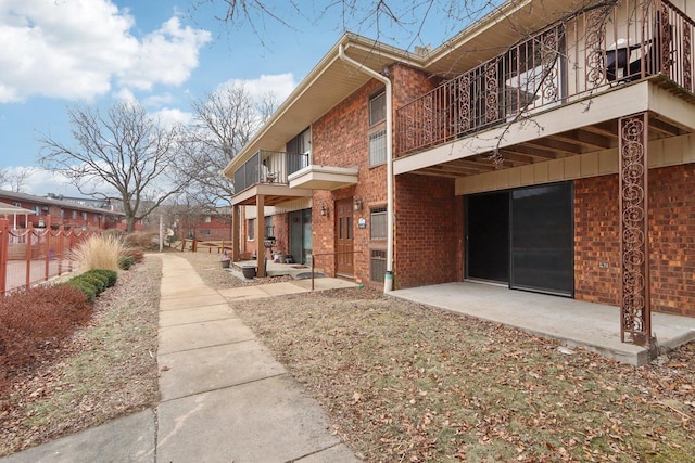 view of home's community featuring a patio area