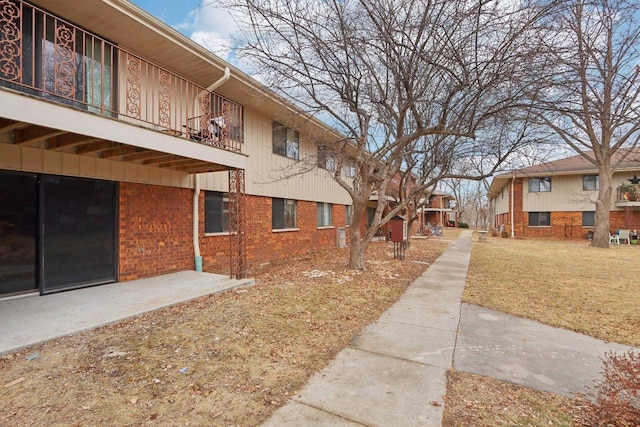 surrounding community with a patio area