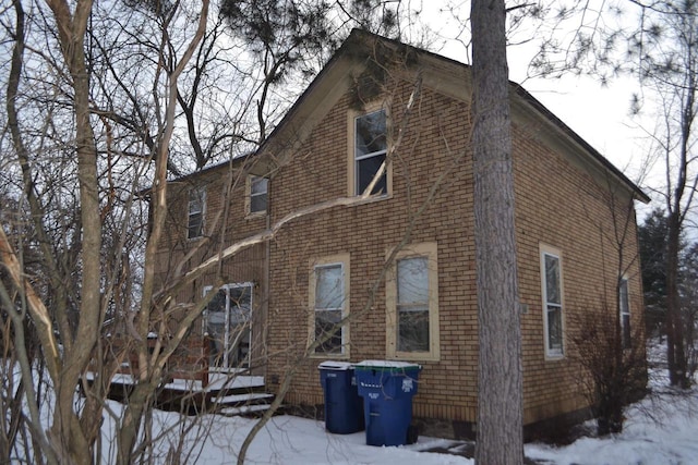 view of snow covered property