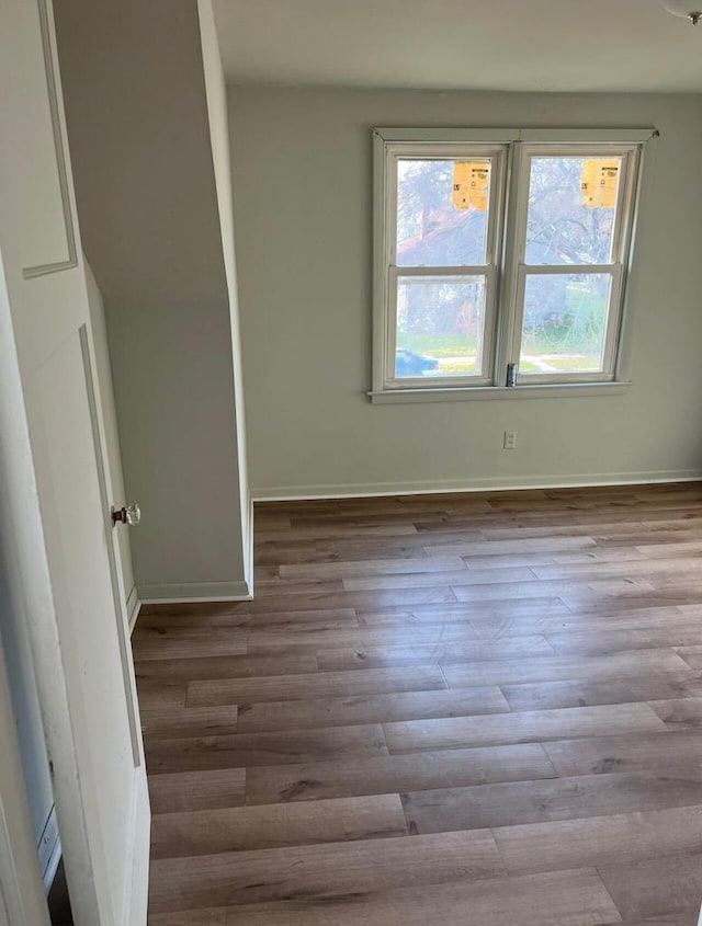 unfurnished room featuring light hardwood / wood-style floors