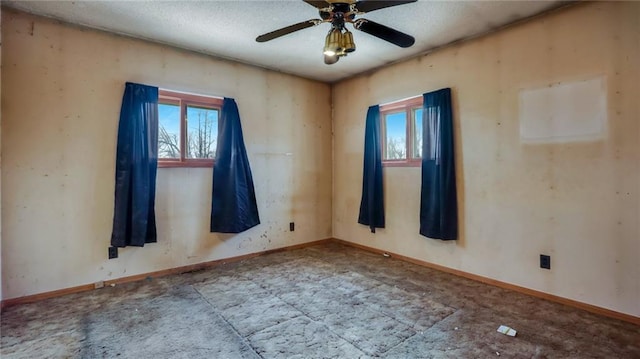 empty room featuring ceiling fan