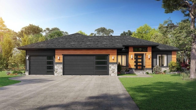 view of front of property featuring a garage and a front lawn