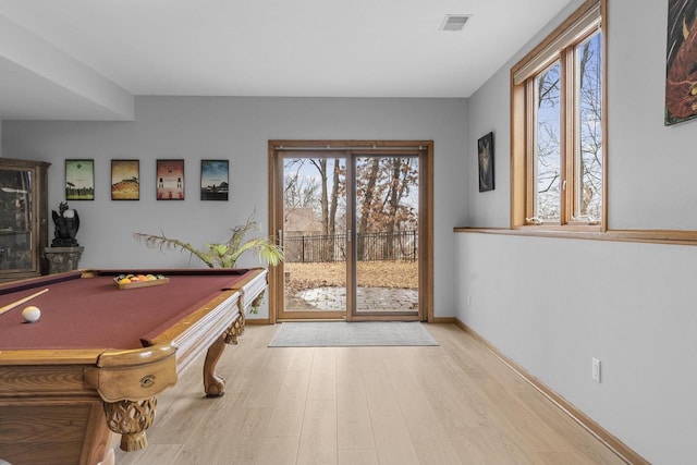 recreation room with light hardwood / wood-style flooring and billiards