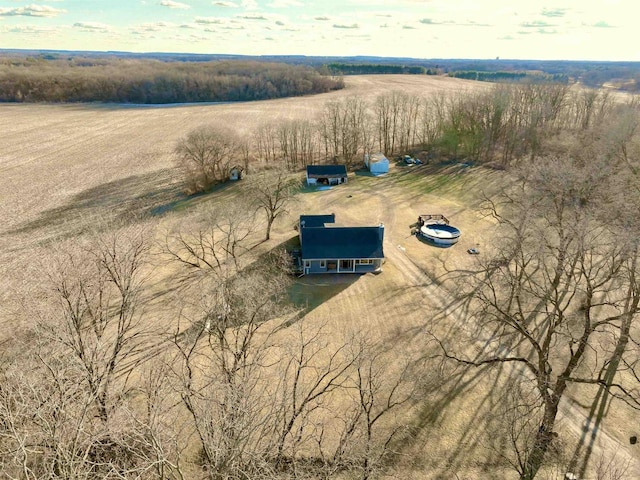 birds eye view of property with a rural view