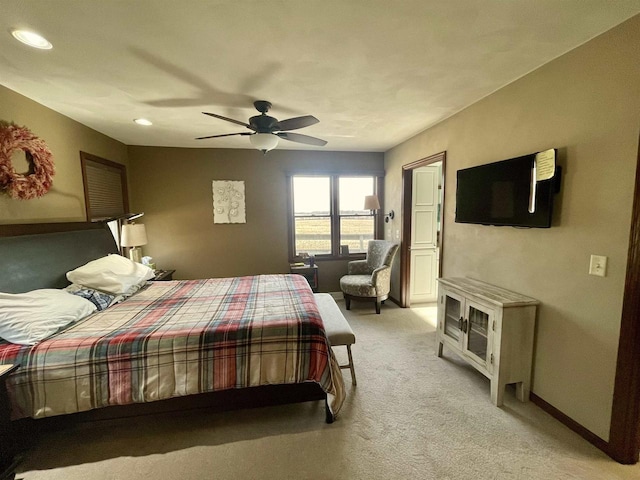 carpeted bedroom featuring ceiling fan