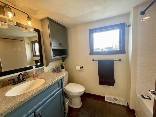 full bathroom with vanity, shower / bathing tub combination, and toilet