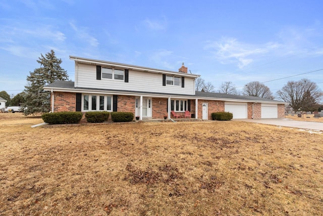 front of property featuring a garage and a front yard