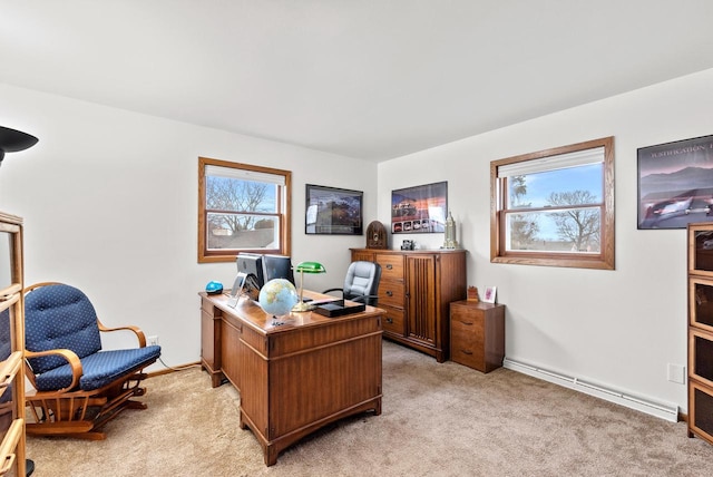 carpeted office space featuring a baseboard radiator