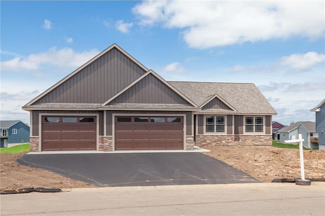 craftsman-style home featuring a garage