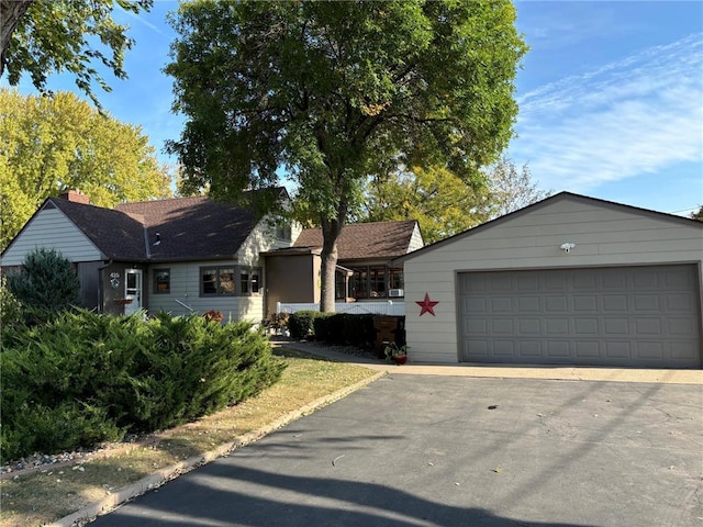 ranch-style house featuring a garage