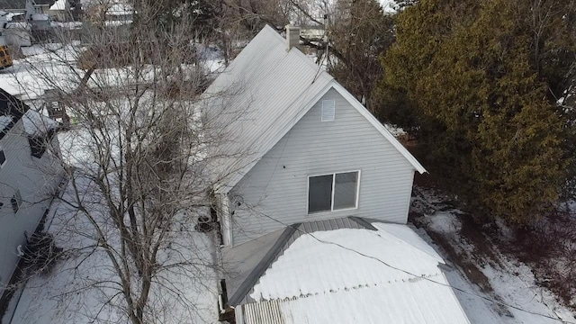 view of snow covered property