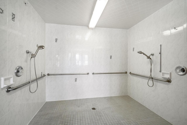 bathroom with a tile shower