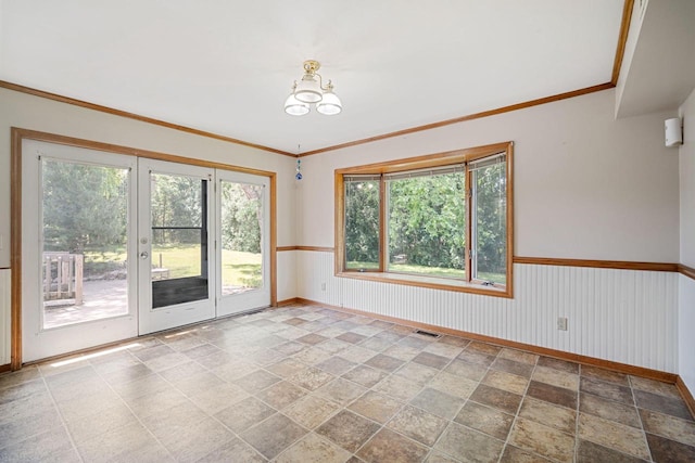 spare room with ornamental molding