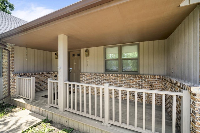 doorway to property featuring covered porch