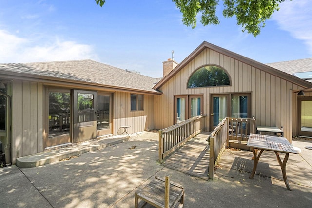 rear view of house featuring a patio