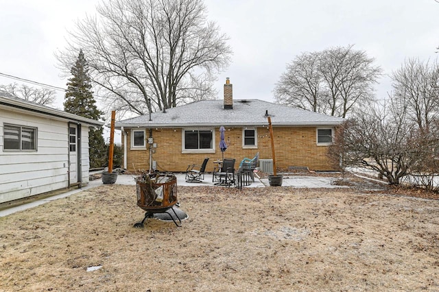 back of house featuring a patio