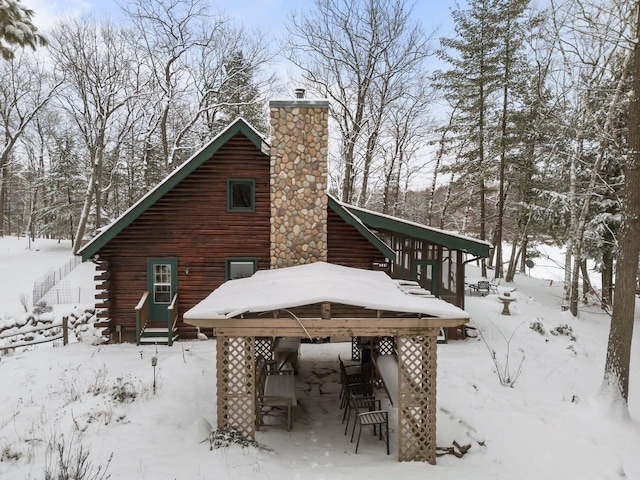 view of snow covered property