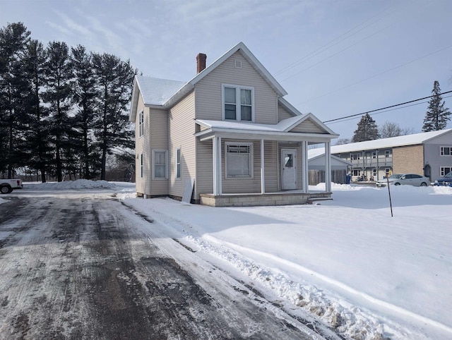 front of property featuring a porch