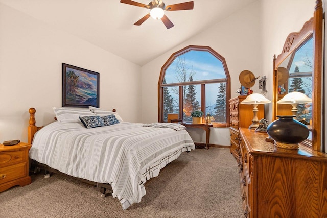 bedroom featuring ceiling fan, carpet flooring, and vaulted ceiling