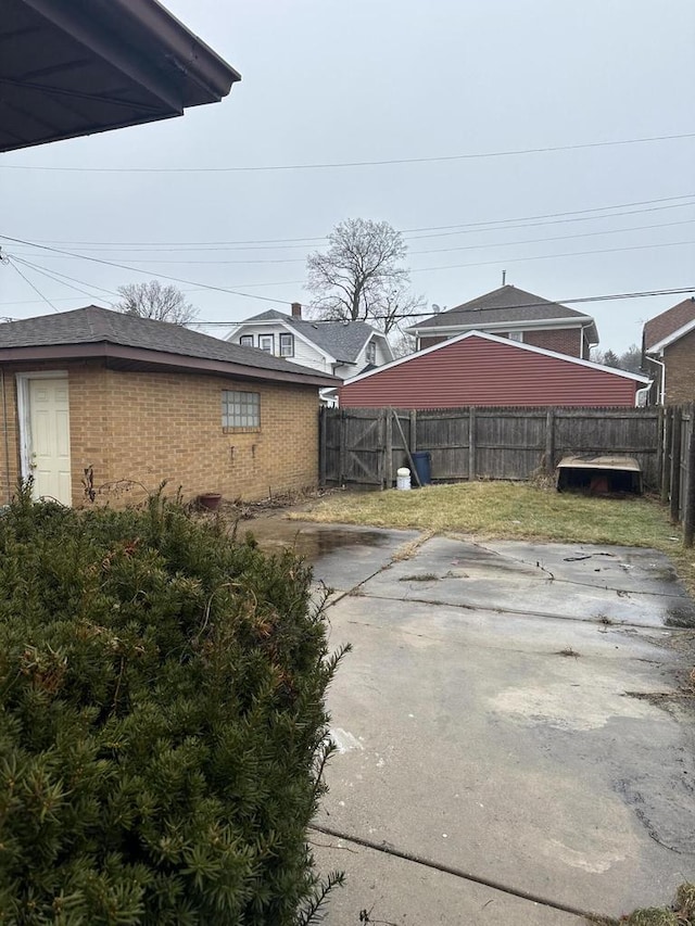 view of side of home featuring a patio