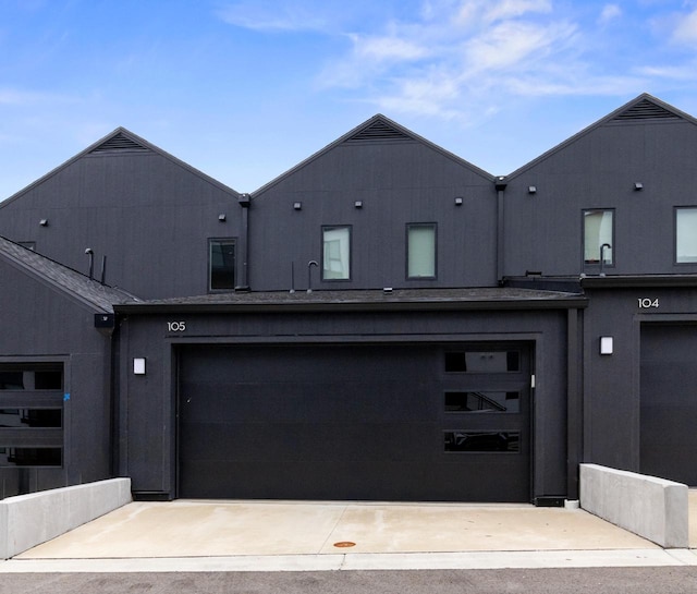 exterior space with a garage