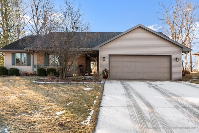 ranch-style house featuring a garage