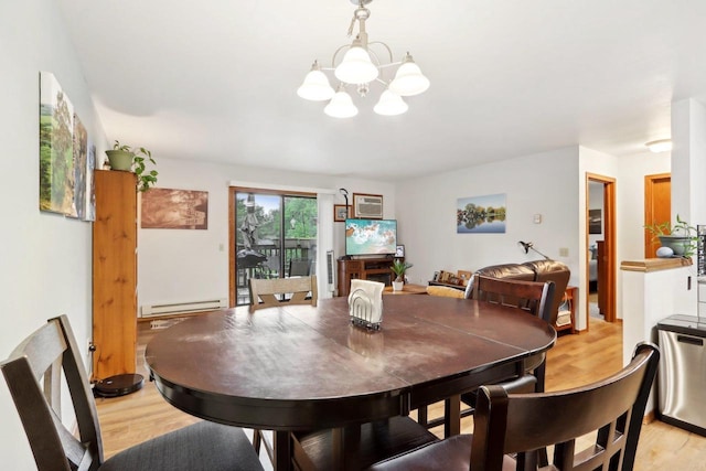 dining area featuring a baseboard radiator, an inviting chandelier, and light hardwood / wood-style flooring