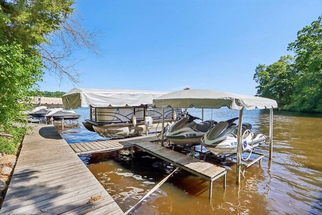 view of dock with a water view