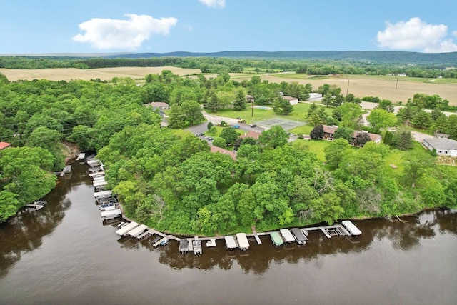 drone / aerial view featuring a water view and a rural view