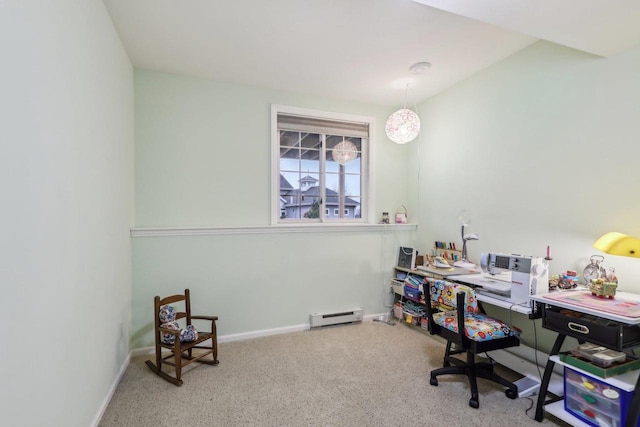 carpeted home office with a baseboard heating unit