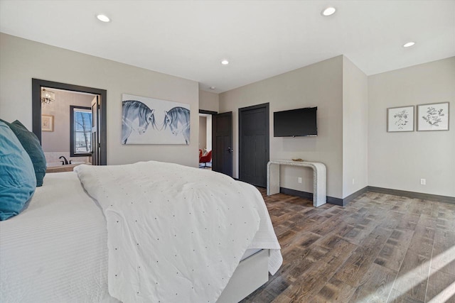 bedroom with hardwood / wood-style flooring