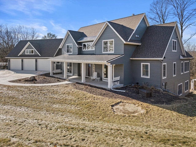 view of front facade featuring a garage and a porch