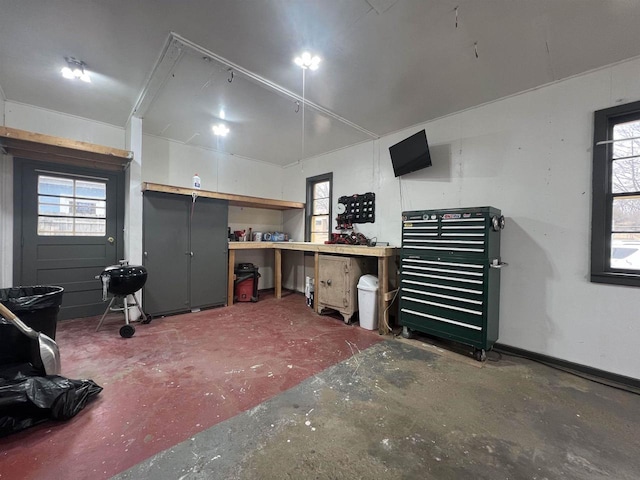 basement with a workshop area