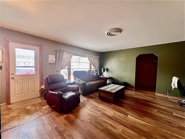 living room with wood-type flooring