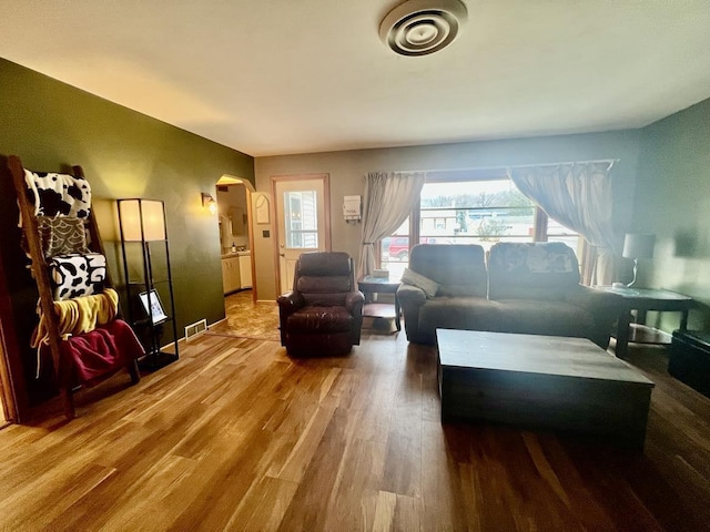 living room with wood-type flooring