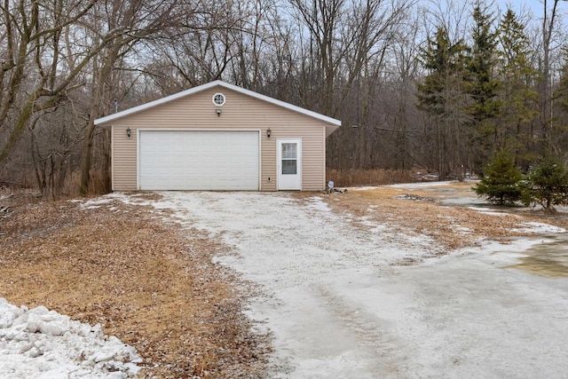 view of snow covered garage