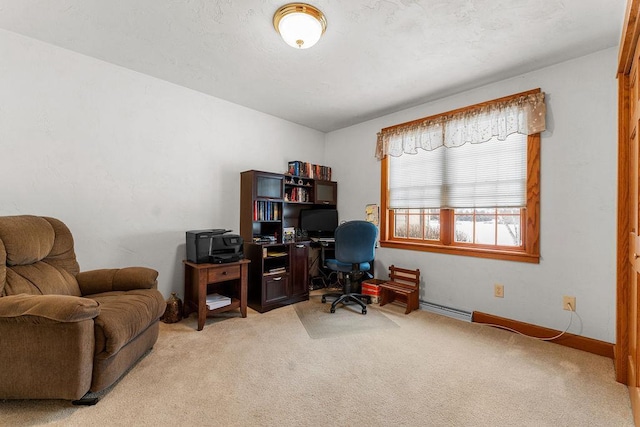 carpeted office space featuring a baseboard heating unit