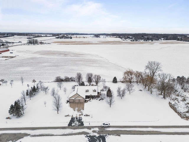 snowy aerial view with a rural view