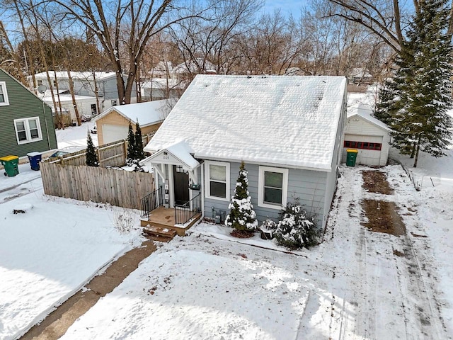 view of front of property with an outbuilding and a garage