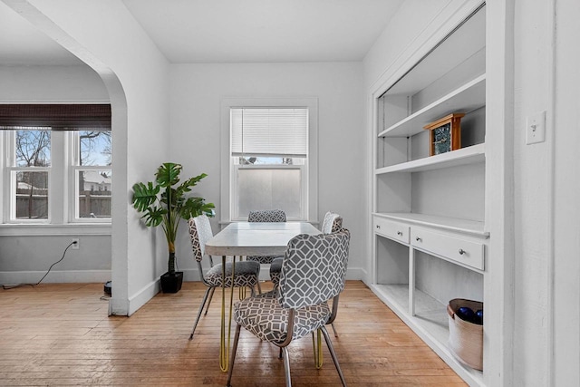 dining room with hardwood / wood-style floors