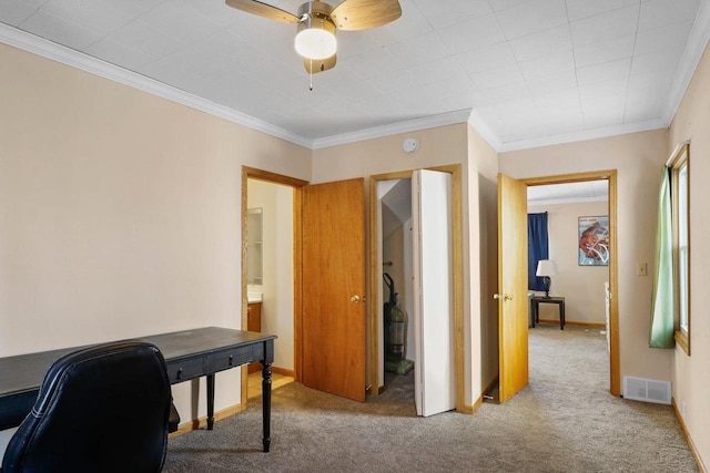 office featuring carpet floors, ornamental molding, and ceiling fan