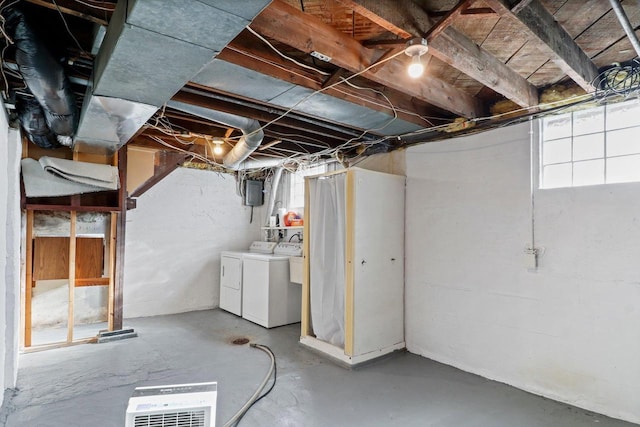 basement with washing machine and clothes dryer