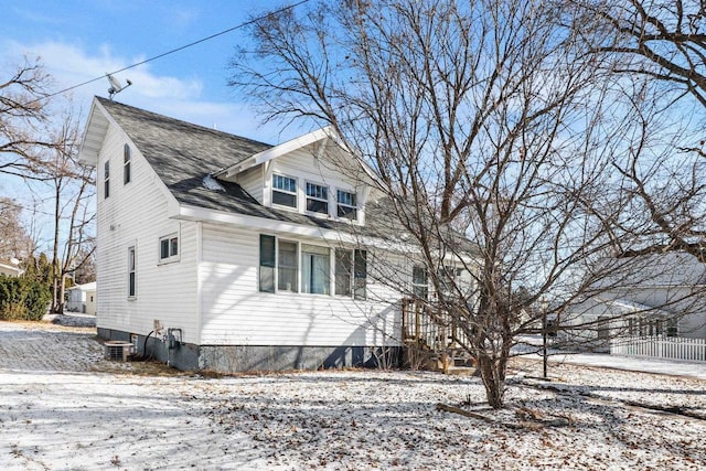 view of front of house with central AC unit