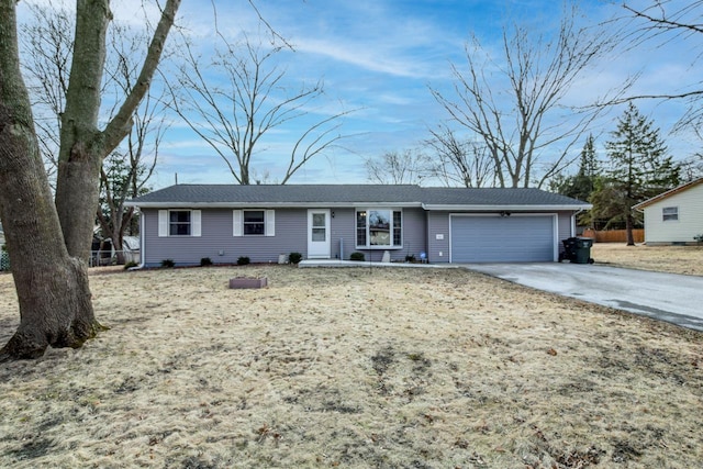 single story home featuring a garage