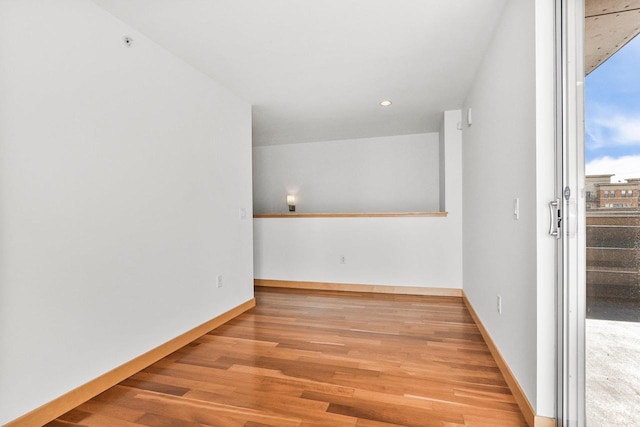 unfurnished room featuring hardwood / wood-style floors