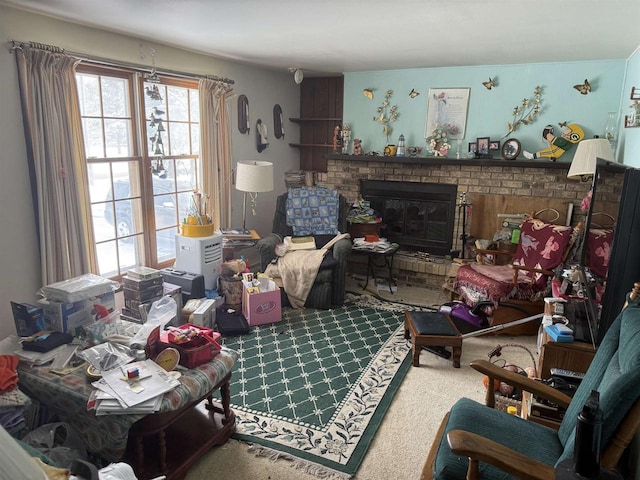 living room with carpet flooring and a fireplace